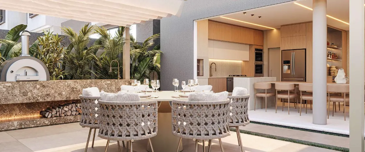 Espaço gourmet com lareira e mesa de jantar, planta A layout 2