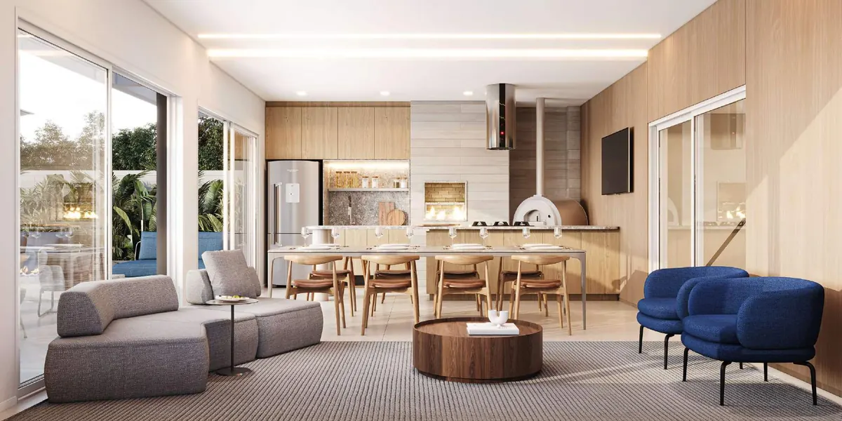 Espaço Gourmet interno com bancada e sofás