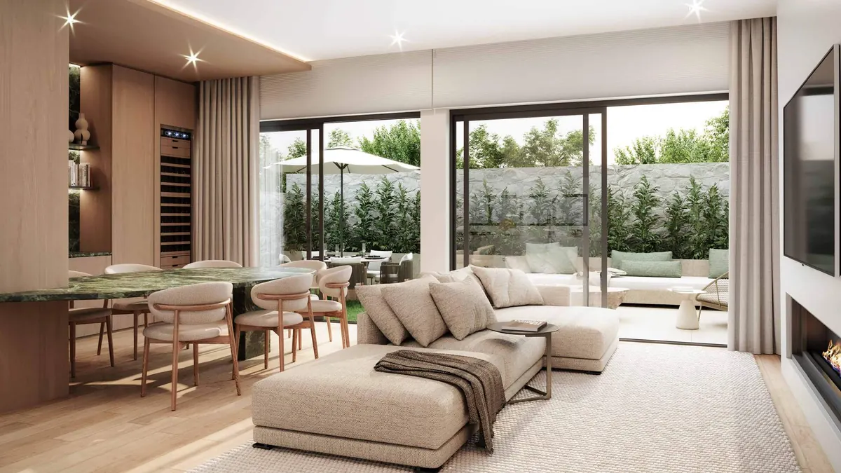 Sala e jantar integrados com vista para o quintal e a área de estar externa