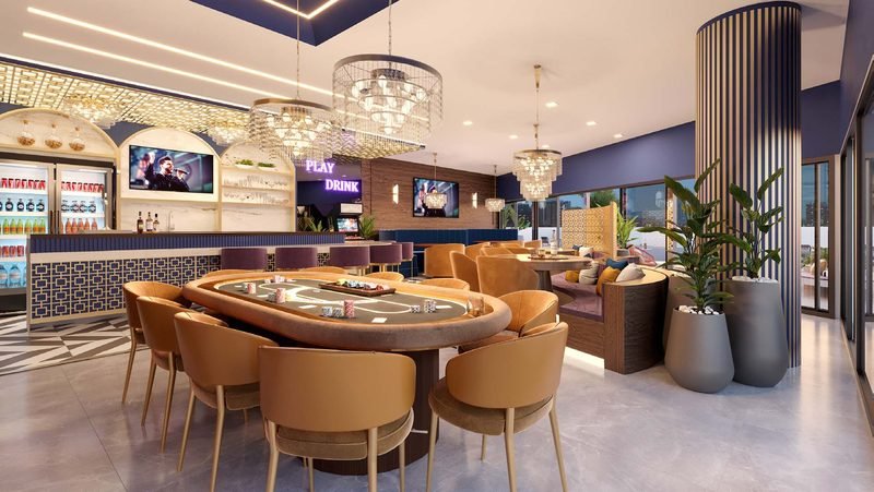 Hub Bar com balcão, mesa de poker e lustres de cristal