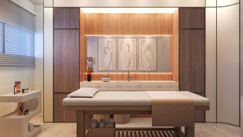 Sala de massagem com maca e painéis de madeira